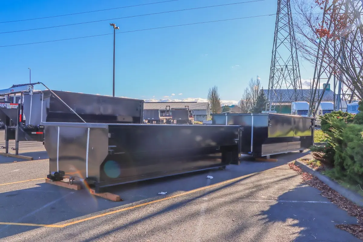 Roll-off dumpster ready for waste disposal at job site for 3 Yard Dumpster Rental in Cumming